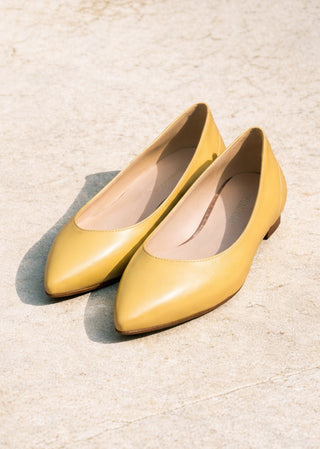 Emilia gold leather ballerina pair by Copardo with pointed toe and minimalist design
