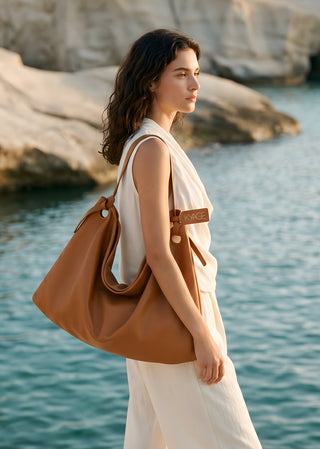 KYAGE biscotto leather hobo bag worn on shoulder lifestyle view