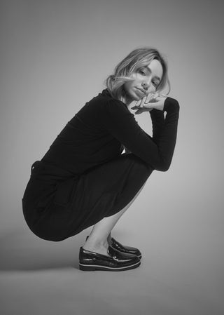 Copardo Maja black patent leather loafers worn on foot lifestyle view