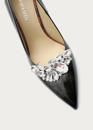 Selina crystal brooch attached to black pumps